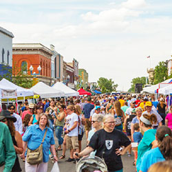 image of downtown Laramie, Wy during outdoor Farmer's Market