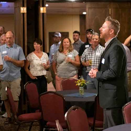 Image of people at a business reception in Laramie, WY